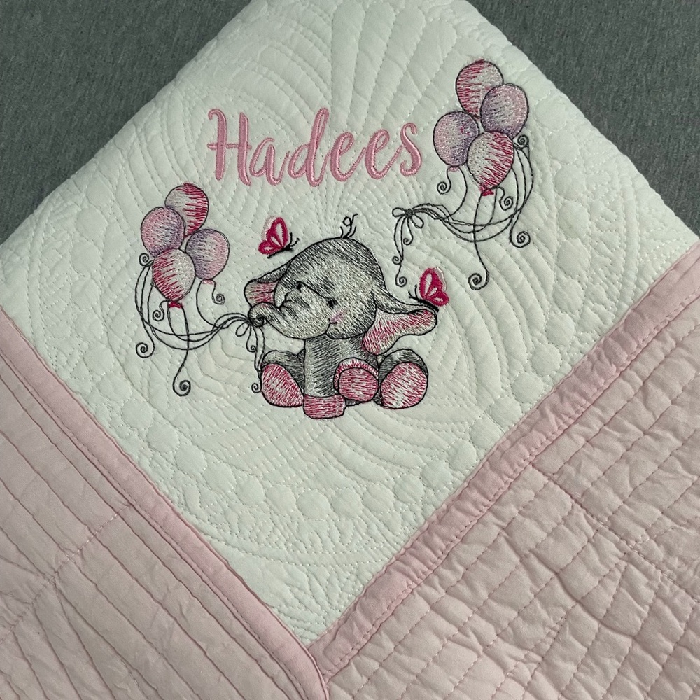 Baby girl heirloom quilt